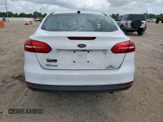 2016 Ford Focus SE with VIN 1FADP3F23GL336750, listed as a Copart auction lot 57972795 with 113,990 mi miles and Salvage title. Bid and sale history available at DreamBid. Image 6.