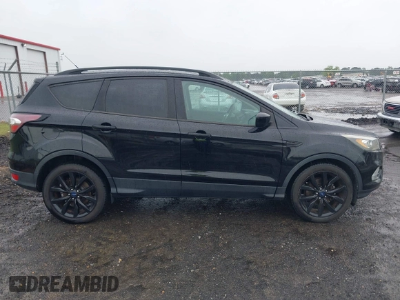2017 Ford Escape SE with VIN 1FMCU0GD3HUD07141, listed as a IAAI auction lot 42250771 with 116,086 mi miles and . Bid and sale history available at DreamBid. Image 14.