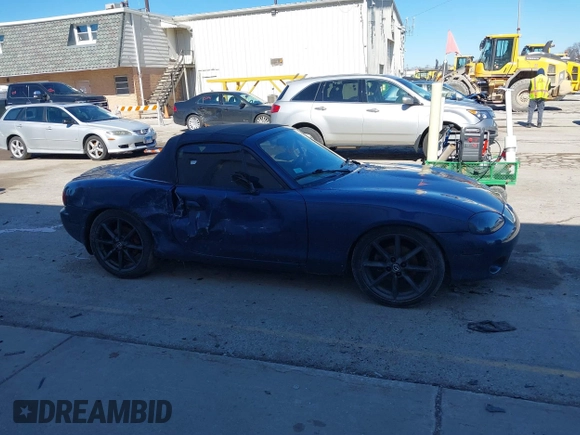 2002 Mazda MX-5 Miata Cloth z VIN JM1NB353920234533, wystawiony jako IAAI lot #41735487 z przebiegiem 112 661 mil mil oraz . Historia ofert i sprzedaży dostępna na DreamBid. Obrazek 13.