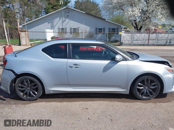 2014 Scion tC with VIN JTKJF5C70E3068144, listed as a IAAI auction lot 41983751 with 137,894 mi miles. Bid and sale history available at carsss.com. Image 13.