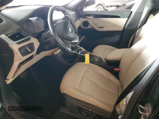2021 BMW X1 sDrive28i z VIN WBXJG7C02M5S30154, wystawiony jako Copart lot #56076565 z przebiegiem 57 671 mil mil oraz Tytuł czysty. Historia ofert i sprzedaży dostępna na DreamBid. Obrazek 7.