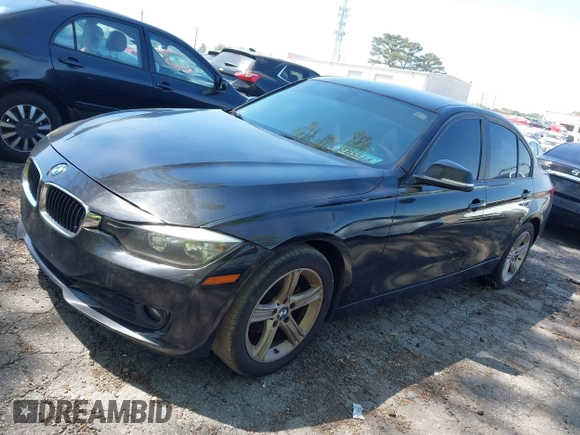2014 BMW 3 Series 320i with VIN WBA3B1C56EK131849, listed as a IAAI auction lot 42018005 with 215,765 mi miles. Bid and sale history available at carsss.com. Image 2.