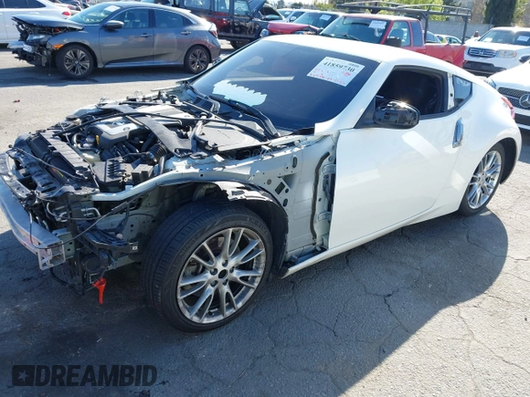 2018 Nissan 370Z Sport with VIN JN1AZ4EH3JM571169, listed as a IAAI auction lot 41859730 with 85,428 mi miles and . Bid and sale history available at DreamBid. Image 2.