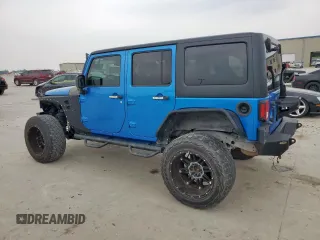 2015 Jeep Wrangler Unlimited Sport with VIN 1C4BJWDG1FL726599, listed as a Copart auction lot 57483935 with 112,067 mi miles and Clean title. Bid and sale history available at DreamBid. Image 2.