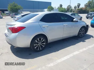 2019 Toyota Corolla L with VIN 5YFBURHE5KP877691, listed as a IAAI auction lot 42108591 with 85,813 mi miles and . Bid and sale history available at DreamBid. Image 4.