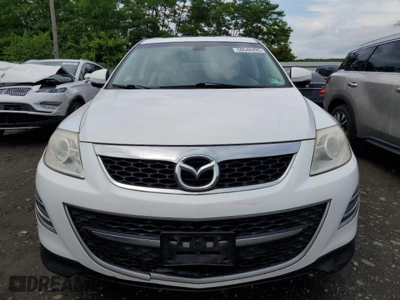 2012 Mazda CX-9 Grand Touring with VIN JM3TB3DV9C0338460, listed as a Copart auction lot 59548495 with 219,060 mi miles and Salvage title. Bid and sale history available at DreamBid. Image 5.