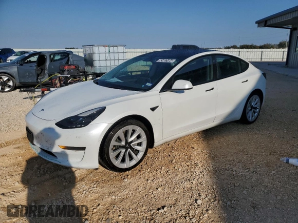 2022 Tesla Model 3 with VIN 5YJ3E1EA7NF184741, listed as a Copart auction lot 82487494 with 133,215 mi miles and Clean Title. Bid and sale history available at DreamBid. Image 1.