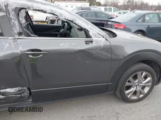 2022 Mazda CX-30 S Premium with VIN 3MVDMBDL9NM434619, listed as a IAAI auction lot 41620655 with 46,557 mi miles and . Bid and sale history available at carsss.com. Image 17.