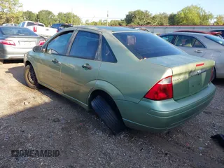 2007 Ford Focus S with VIN 1FAFP34N87W306678, listed as a IAAI auction lot 37470959 with 81,308 mi miles and . Bid and sale history available at DreamBid. Image 3.
