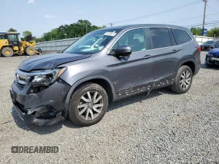 2019 Honda Pilot EX-L with VIN 5FNYF6H54KB052448, listed as a Copart auction lot 60498925 with 146,113 mi miles and Salvage title. Bid and sale history available at DreamBid. Image 1.