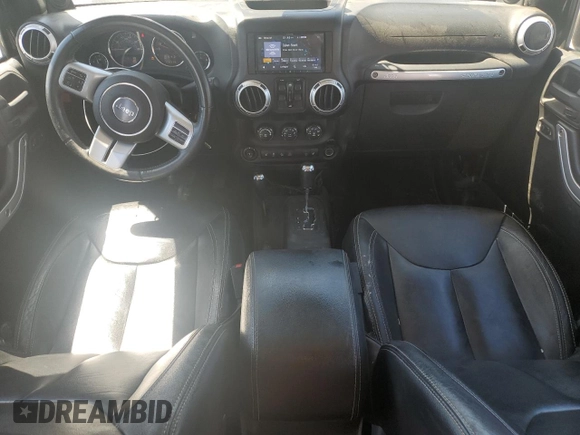 2014 Jeep Wrangler Unlimited Rubicon с VIN 1C4BJWFG7EL119344, выставлен на аукционе Copart как лот 65652265 с пробегом 150 934 миль миль и Списание • Salvage title. История ставок и продаж доступна на DreamBid. Изображение 8.