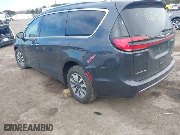 2021 Chrysler Pacifica Hybrid Touring L z VIN 2C4RC1L7XMR593987, wystawiony jako IAAI lot #41855966 z przebiegiem 72 685 mil mil oraz . Historia ofert i sprzedaży dostępna na DreamBid. Obrazek 3.