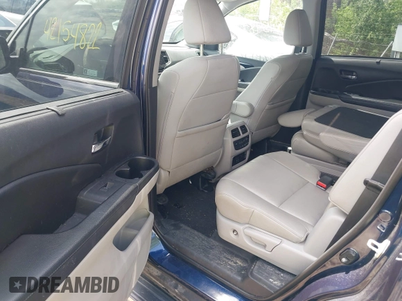 2019 Honda Pilot Touring 7-Passenger z VIN 5FNYF6H63KB000365, wystawiony jako IAAI lot #42154822 z przebiegiem 238 032 mil mil oraz . Historia ofert i sprzedaży dostępna na DreamBid. Obrazek 8.