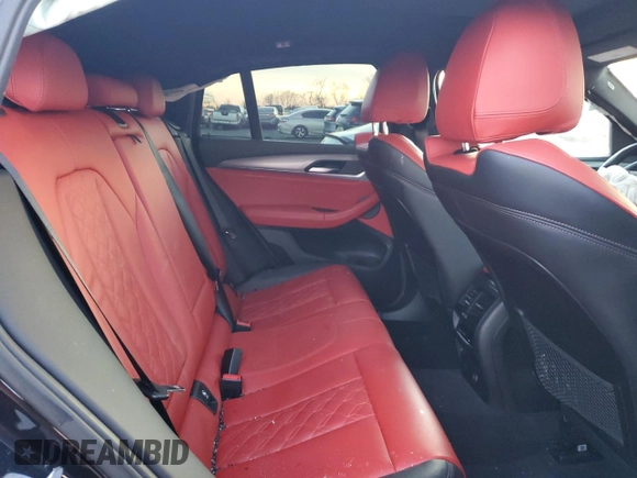 2019 BMW X4 M40i z VIN 5UXUJ5C5XKLA93583, wystawiony jako Copart lot #84643664 z przebiegiem Nie podano mil oraz Szkoda całkowita • Salvage title. Historia ofert i sprzedaży dostępna na DreamBid. Obrazek 11.
