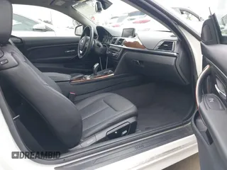 2015 BMW 4 Series 428i with VIN WBA3N7C58FK222925, listed as a IAAI auction lot 41776858 with 106,946 mi miles and . Bid and sale history available at carsss.com. Image 5.