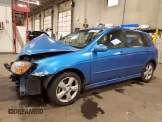 2007 Kia Spectra with VIN KNAFE161775007569, listed as a Copart auction lot 86778784 with 125,463 mi miles and Salvage Title. Bid and sale history available at carsss.com. Image 1.