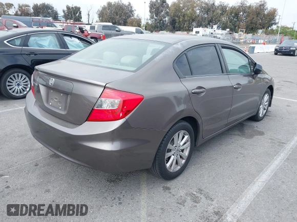 2012 Honda Civic EX with VIN 2HGFB2F89CH517330, listed as a IAAI auction lot 42116208 with 196,861 mi miles and . Bid and sale history available at DreamBid. Image 4.