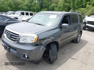 2012 Honda Pilot EX-L with VIN 5FNYF4H52CB081078, listed as a IAAI auction lot 42340966 with 223,319 mi miles and . Bid and sale history available at DreamBid. Image 2.