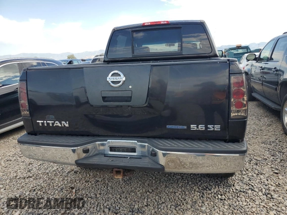 2010 Nissan Titan XE with VIN 1N6BA0EJ5AN318639, listed as a Copart auction lot 69776984 with 158,913 mi miles and Salvage Title. Bid and sale history available at carsss.com. Image 6.
