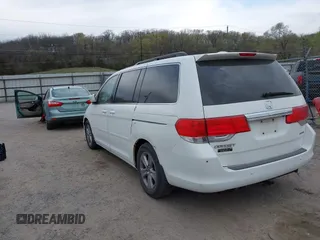 2010 Honda Odyssey Touring with VIN 5FNRL3H99AB005395, listed as a IAAI auction lot 42027445 with 181,559 mi miles. Bid and sale history available at carsss.com. Image 3.