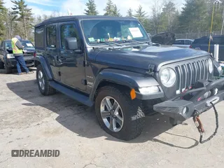 2018 Jeep Wrangler Unlimited Sahara with VIN 1C4HJXEG0JW246110, listed as a IAAI auction lot 41826662 with 65,236 mi miles. Bid and sale history available at carsss.com. Image 6.