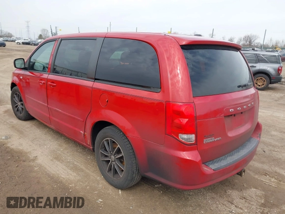 2014 Dodge Grand Caravan SXT with VIN 2C4RDGCG1ER371386, listed as a IAAI auction lot 41822952 with 228,052 mi miles and . Bid and sale history available at DreamBid. Image 3.