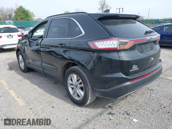 2015 Ford Edge SEL with VIN 2FMTK4J88FBB05259, listed as a IAAI auction lot 42043247 with 128,987 mi miles. Bid and sale history available at carsss.com. Image 3.
