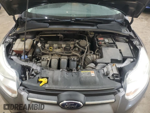 2014 Ford Focus SE z VIN 1FADP3K2XEL255540, wystawiony jako Copart lot #57070215 z przebiegiem 236 707 mil mil oraz Czysty tytuł • Clean title. Historia ofert i sprzedaży dostępna na DreamBid. Obrazek 11.