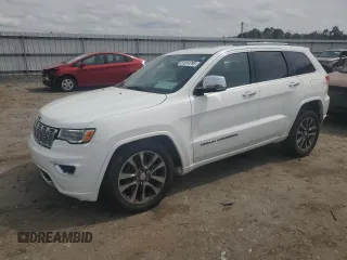 2018 Jeep Grand Cherokee Overland with VIN 1C4RJFCG5JC437508, listed as a Copart auction lot 51814795 with 104,598 mi miles and Salvage title. Bid and sale history available at DreamBid. Image 1.
