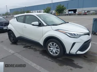 2021 Toyota C-HR LE with VIN JTNKHMBX1M1098521, listed as a IAAI auction lot 41539775 with 14,840 mi miles. Bid and sale history available at carsss.com. Image 1.