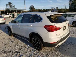 2020 BMW X1 xDrive28i with VIN WBXJG9C02L3L57542, listed as a Copart auction lot 67003112 with 18,619 mi miles. Bid and sale history available at carsss.com. Image 3.