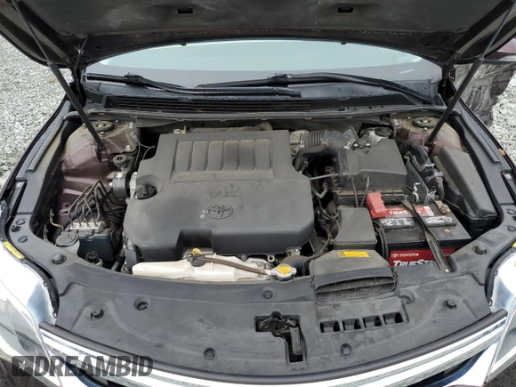 2013 Toyota Avalon XLE with VIN 4T1BK1EB9DU024116, listed as a Copart auction lot 61399425 with 69,392 mi miles and Salvage title. Bid and sale history available at DreamBid. Image 11.