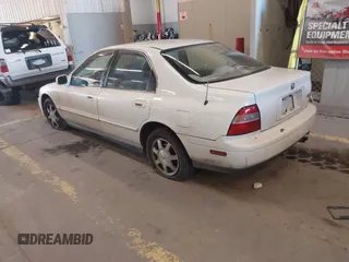 1994 Honda Accord EX with VIN JHMCD5654RC081998, listed as a IAAI auction lot 42052781 with 148,095 mi miles and . Bid and sale history available at carsss.com. Image 3.