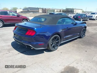 2020 Ford Mustang EcoBoost with VIN 1FATP8UH2L5127689, listed as a IAAI auction lot 42219307 with 21,399 mi miles and . Bid and sale history available at DreamBid. Image 4.