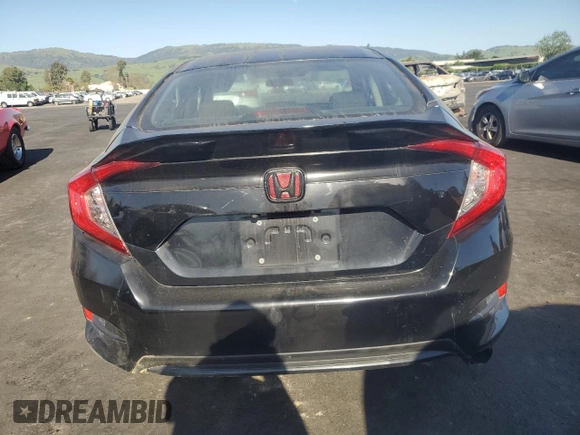 2019 Honda Civic LX with VIN 19XFC2F62KE202065, listed as a Copart auction lot 51545845 with Not Provided miles and Salvage Title. Bid and sale history available at DreamBid. Image 6.