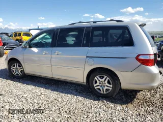2007 Honda Odyssey EX-L z VIN 5FNRL38647B028078, wystawiony jako Copart lot #56208005 z przebiegiem 192 000 mil mil oraz Szkoda całkowita • Salvage title. Historia ofert i sprzedaży dostępna na DreamBid. Obrazek 2.