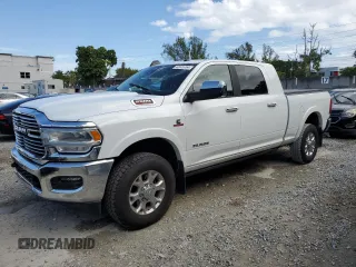 2020 Ram 2500 Laramie with VIN 3C6UR5NL8LG313893, listed as a Copart auction lot 42675764 with 128,135 mi miles and Salvage Title. Bid and sale history available at carsss.com. Image 1.
