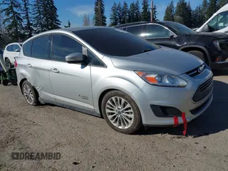 2017 Ford C-Max Energi SE with VIN 1FADP5EU4HL104514, listed as a IAAI auction lot 41644750 with 77,316 mi miles. Bid and sale history available at carsss.com. Image 1.