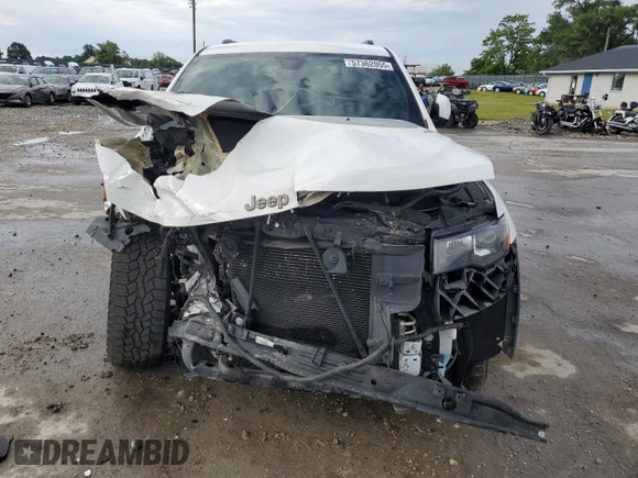 2017 Jeep Grand Cherokee 75th Anniversary with VIN 1C4RJEAG3HC696232, listed as a Copart auction lot 57362055 with 105,440 mi miles and Salvage title. Bid and sale history available at DreamBid. Image 5.