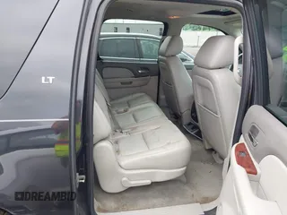 2011 Chevrolet Suburban with VIN 1GNWKMEG1BR374950, listed as a IAAI auction lot 42781182 with 304,690 mi miles and . Bid and sale history available at DreamBid. Image 8.