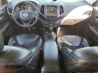 2019 Jeep Cherokee Trailhawk with VIN 1C4PJMBX7KD336494, listed as a Copart auction lot 50346545 with 69,994 mi miles and Salvage Title. Bid and sale history available at DreamBid. Image 8.