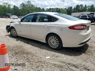2015 Ford Fusion SE Hybrid with VIN 3FA6P0LU1FR210884, listed as a Copart auction lot 60035595 with 125,798 mi miles and Salvage title. Bid and sale history available at DreamBid. Image 2.
