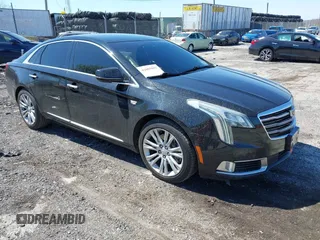 2018 Cadillac XTS Luxury with VIN 2G61M5S39J9161938, listed as a IAAI auction lot 42005882 with 102,335 mi miles. Bid and sale history available at carsss.com. Image 1.
