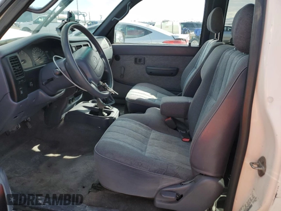 1999 Toyota Tacoma with VIN 4TAWN72N2XZ434256, listed as a Copart auction lot 49873685 with 285,424 mi miles and Salvage title. Bid and sale history available at DreamBid. Image 7.