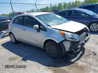 2013 Kia Rio LX with VIN KNADM5A33D6307061, listed as a IAAI auction lot 42143985 with 66,621 mi miles. Bid and sale history available at carsss.com. Image 1.