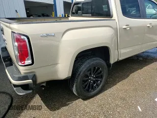 2021 GMC Canyon 4WD Elevation with VIN 1GTG6CEN1M1275962, listed as a Copart auction lot 69860444 with 86,886 mi miles and Salvage Title. Bid and sale history available at carsss.com. Image 13.