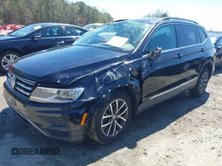 2020 Volkswagen Tiguan SE with VIN 3VV3B7AX1LM139519, listed as a IAAI auction lot 41890276 with 147,303 mi miles and . Bid and sale history available at DreamBid. Image 2.