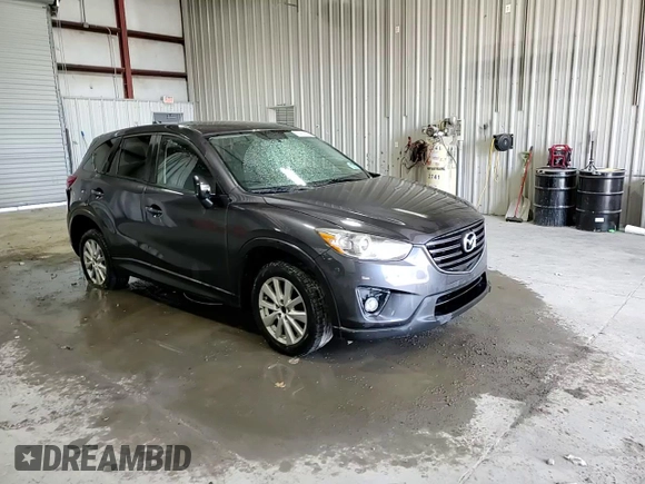 2016 Mazda CX-5 Touring with VIN JM3KE4CY3G0716346, listed as a Copart auction lot 51467895 with 133,218 mi miles and Salvage Title. Bid and sale history available at carsss.com. Image 14.