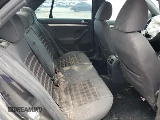 2009 Volkswagen Jetta GLI z VIN 3VWDJ71K79M042969, wystawiony jako Copart lot #50803665 z przebiegiem 191 689 mil mil oraz Szkoda całkowita • Salvage title. Historia ofert i sprzedaży dostępna na DreamBid. Obrazek 10.