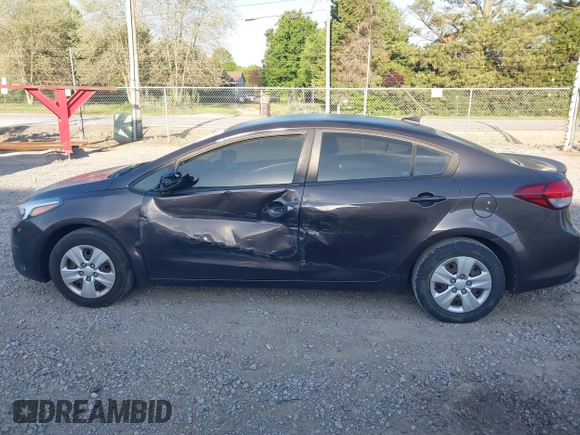 2018 Kia Forte LX with VIN 3KPFL4A70JE182702, listed as a IAAI auction lot 42043345 with 105,451 mi miles and . Bid and sale history available at DreamBid. Image 14.